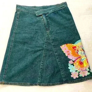 Jean skirt, size Medium with butterfly embellishment​